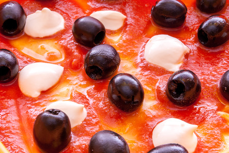 the real Neapolitan pizza with tomato and black olives
