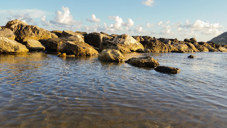 marine rocks protect the Roman coast from the waves