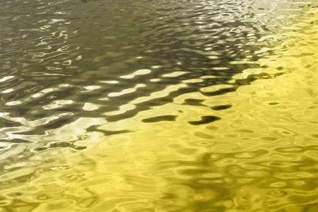 Rippling water background in trendy colors 2021. Gray and Yellowの写真素材