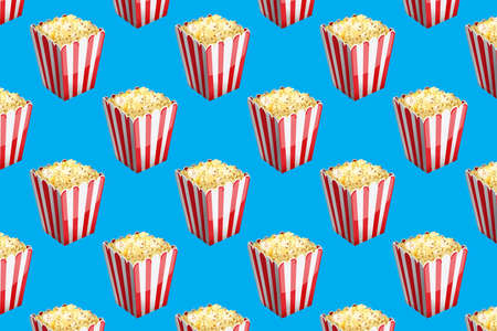 Movie popcorn pattern on blue background. Wallpaperの写真素材