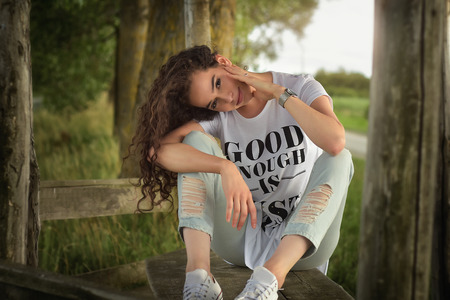 Closeup shot of girl posing in forestの写真素材