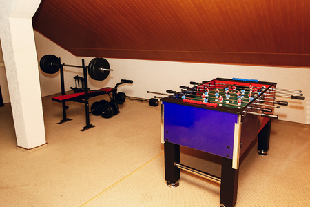 Tabletop game - foosball table hobby, table soccer sport in recreational room in rehabilitation...