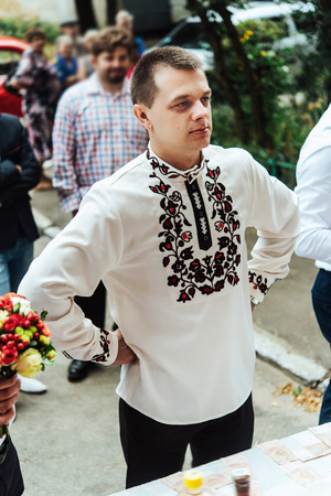 stylish groom with his best men waiting for a bride, wedding ceremonyの写真素材