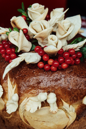 stylish unique wedding cake with flowers and berries, ukrainian traditional delicious pastryの写真素材