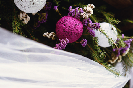 stylish decorated place with flowers and ribbons at the reception in a restaurant for a wedding ceremonyの写真素材