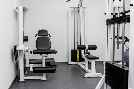 modern gym weight training equipment for exercises and rehab, leg presses. rehabilitation equipment...