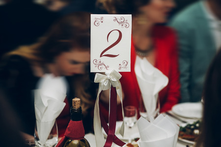 table setting number two at wedding reception, catering in restaurantの写真素材