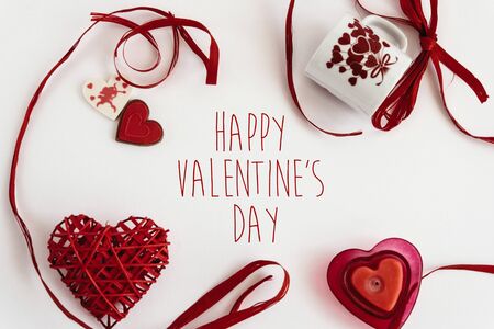 stylish heart love elements on white background, happy valentines day text, greeting card conceptの写真素材