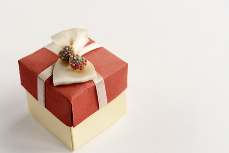 stylish luxury heart earrings with colorful gems on white background, space for text, valentine's day conceptの写真素材