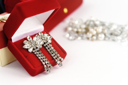 luxury vintage earrings in red gift box on white background, present and love concept, valentine's dayの写真素材