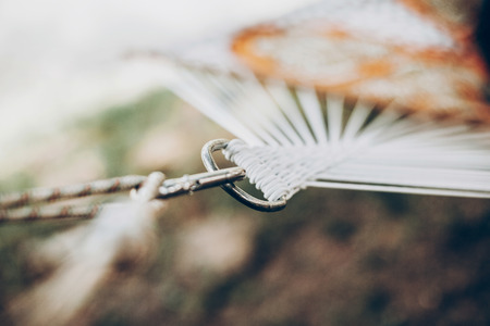 detail of hammock. steel elements and white knot rope, construction support system, close up. space for textの写真素材
