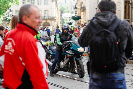 Lviv, Ukraine - May 6, 2017: cycling marathon VIII Lviv 100km ride, 425 bicycles, in the streets of the city. participants and athletes riding bikes. mass start, people in uniformのeditorial素材