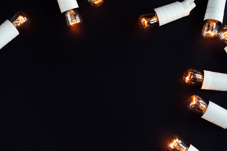 amazing beautiful unique christmas golden vintage garland lights on stylish black backgroundの写真素材