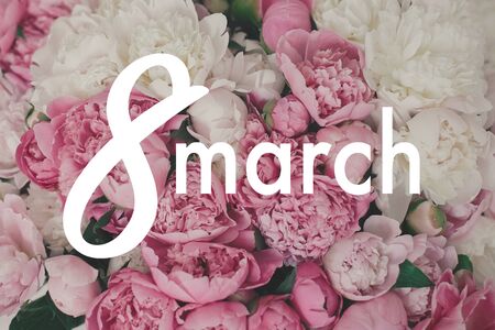 8 March text. 8 march lettering on stylish pink and white peony flowers bouquet. Happy Women's day....