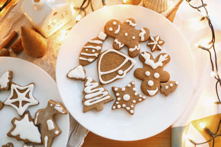 Decorated christmas tree, star and reindeer cookies with sugar frosting, flat lay. Gingerbread...