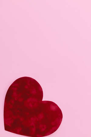 Happy Valentine's Day! Stylish valentine heart on pink background flat lay with space for text....