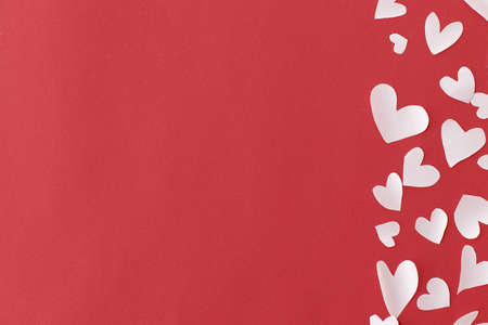 Stylish hearts border on red background flat lay with space for text. Happy Valentine's Day! Cute...