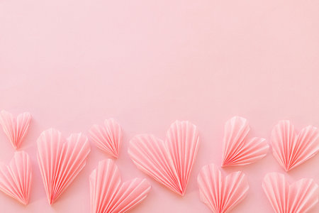 Happy Valentine's day! Stylish pink hearts flat lay on pink paper background. Modern cute valentine...