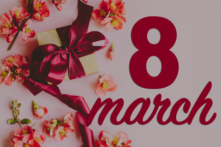 Happy womens day greeting card. 8 march sign text and stylish gift box with flowers on pink...