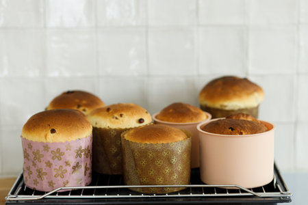 Baked fresh easter traditional bread on countertop in modern kitchen. Making homemade easter cake. Orthodox traditional food paskaの写真素材