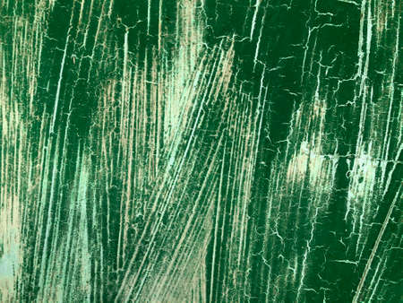 Texture of green paint on the wall, painted surface with brush stainsの写真素材