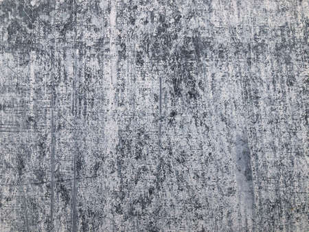 Painted gray wall with white brush strokes
