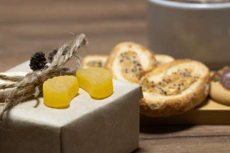 Marmalade is beautifully decorated, tangerine marmalade slices on the table.の写真素材