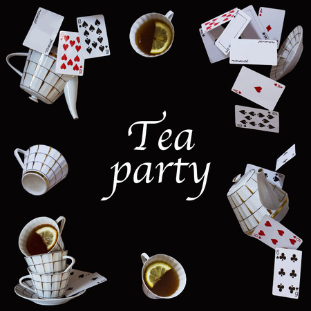 Wonderland background. Mad tea party. Cups, teapot and playing cards falling down the rabbit hole.の写真素材
