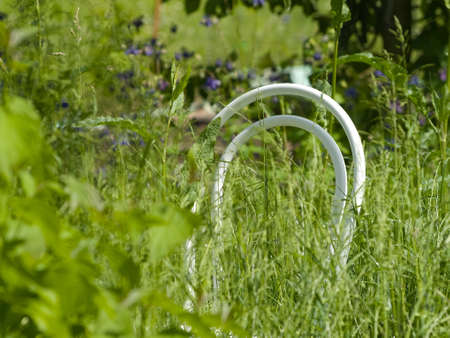 Decoration in the garden chair in the grassの写真素材