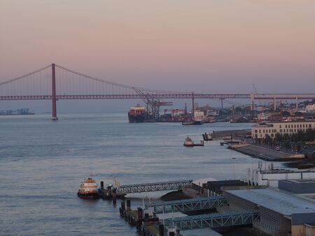 sunraise over the port of lisbon