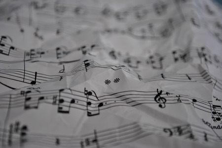 musical score blured with distinct musical notesの写真素材