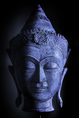 Calm cool buddha head, Cool blue tone accentuating the relaxed feel of this spiritual image.の写真素材