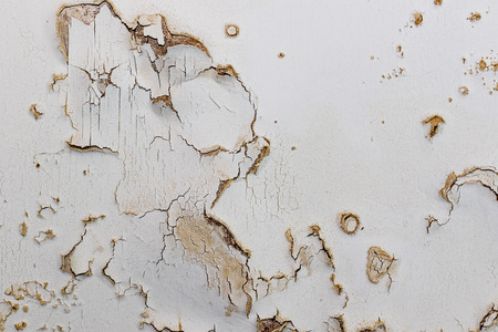 Blown plaster on an old internal wall. Damaged damp plasterwork in need of repair. House renovation...
