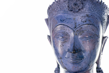 Buddha face against white background. Modern contemporary purple blue zen buddhism statue. Buddhist carving.の写真素材