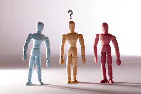 Gender stereotype. Questioning sexual identity. Neutral transgender person between blue and pink...