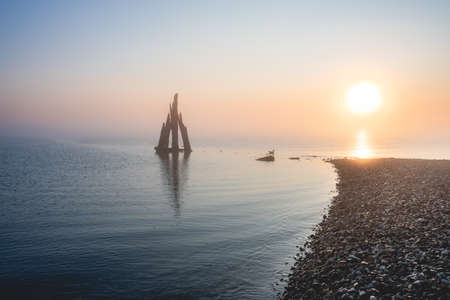 Misty morning at the coast, Den Osse Zealand, The Netherlands.の写真素材