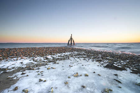 Ice cold morning on the coast in Den Osse Zeeland, The Netherlandsの写真素材