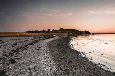Sunset at the Kalo Castle in Denmark, Old ruin.