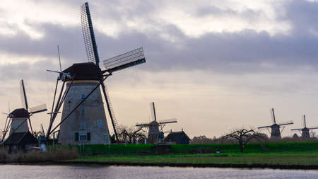 Windmills on a very cloudy day at Kinderdijk in The Netherlands.の写真素材