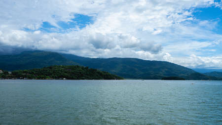 Boat cruise from Paraty to the beautiful islands and beaches around the coast. Paraty RJ Brazil.の写真素材