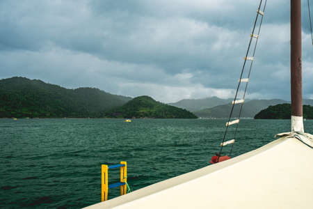 Boat cruise from Paraty to the beautiful islands and beaches around the coast. Paraty RJ Brazil.の写真素材