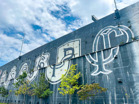 Wall with graffiti from the logos of the football club Corinthians, next to the stadium. Sao Paulo,...