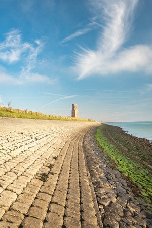 Plump Tower. An Old tower from the 14th century, in the dutch place Burgh-Haamstede. Zeeland, The Netherlands.の写真素材