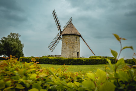 Moulin de pierre, old windmill in Hauville, France.の写真素材