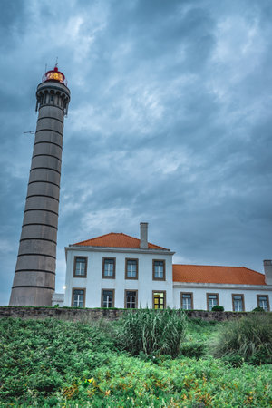 Farol de Leca, lighthouse on the coast of Porto, Portugal.の写真素材