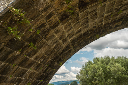 The Roman bridge at Ponte de Lima, Portugal.の写真素材