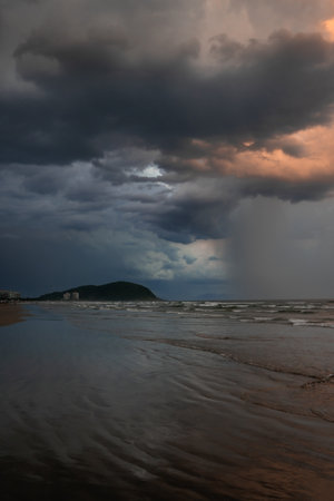 Dark clouds over the beach of Bertioga, SÃ£o Paulo, Brazil.の写真素材