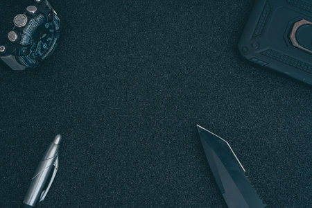 Knife on a black background. Top view. Copy space.
