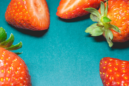 Strawberries on a green background. Strawberries on a green background.