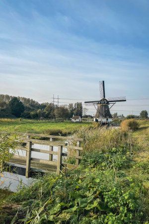 Sheep pasture mill, Dutch windmill in Rijswijk, The Netherlands.の写真素材